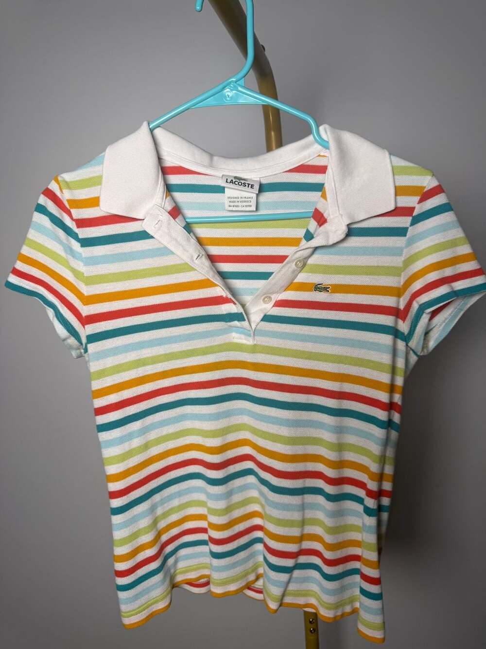 Lacoste Rainbow Striped Polo Shirt fits like a small